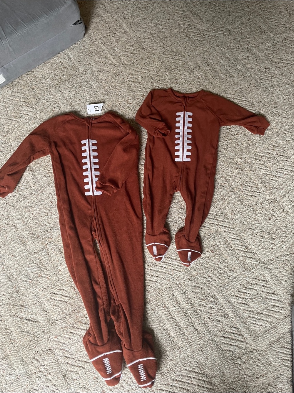Children’s Place Brown Football Footed One-Piece Pajamas